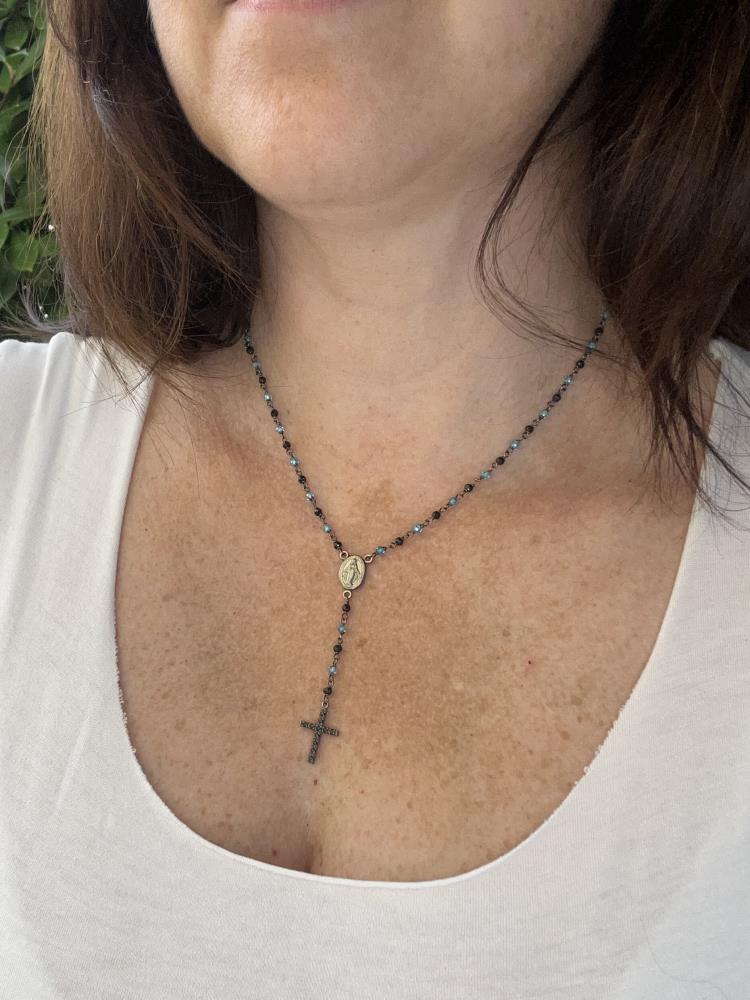 Necklace with cross, blue zircons and black spinel